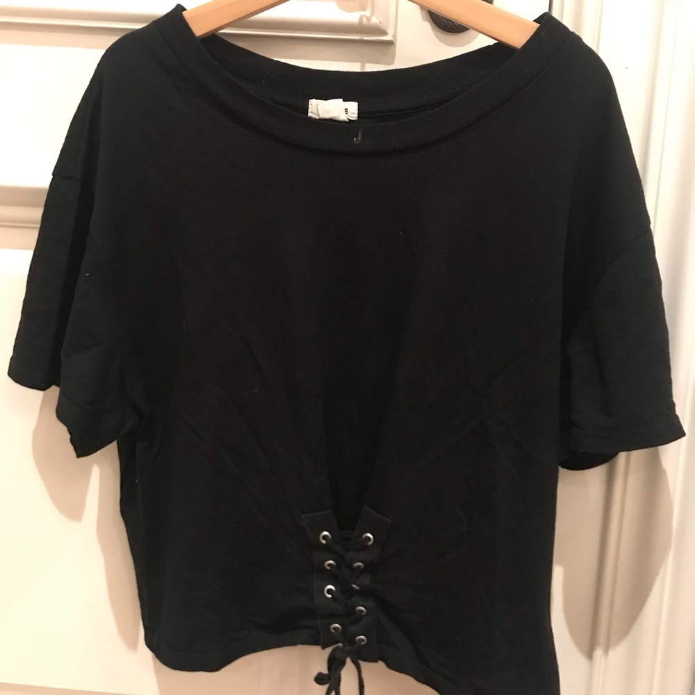 garage black t-shirt that ties at bottom